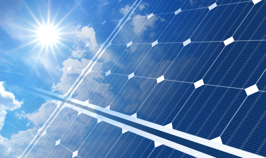 solar panels on blue sky and sun