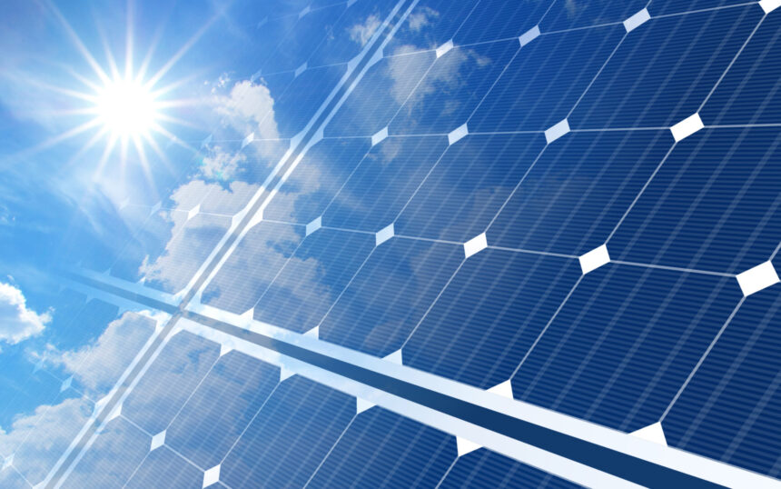 solar panels on blue sky and sun